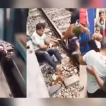 Pai salva filho em trilhos durante passagem de trem em Bangladesh